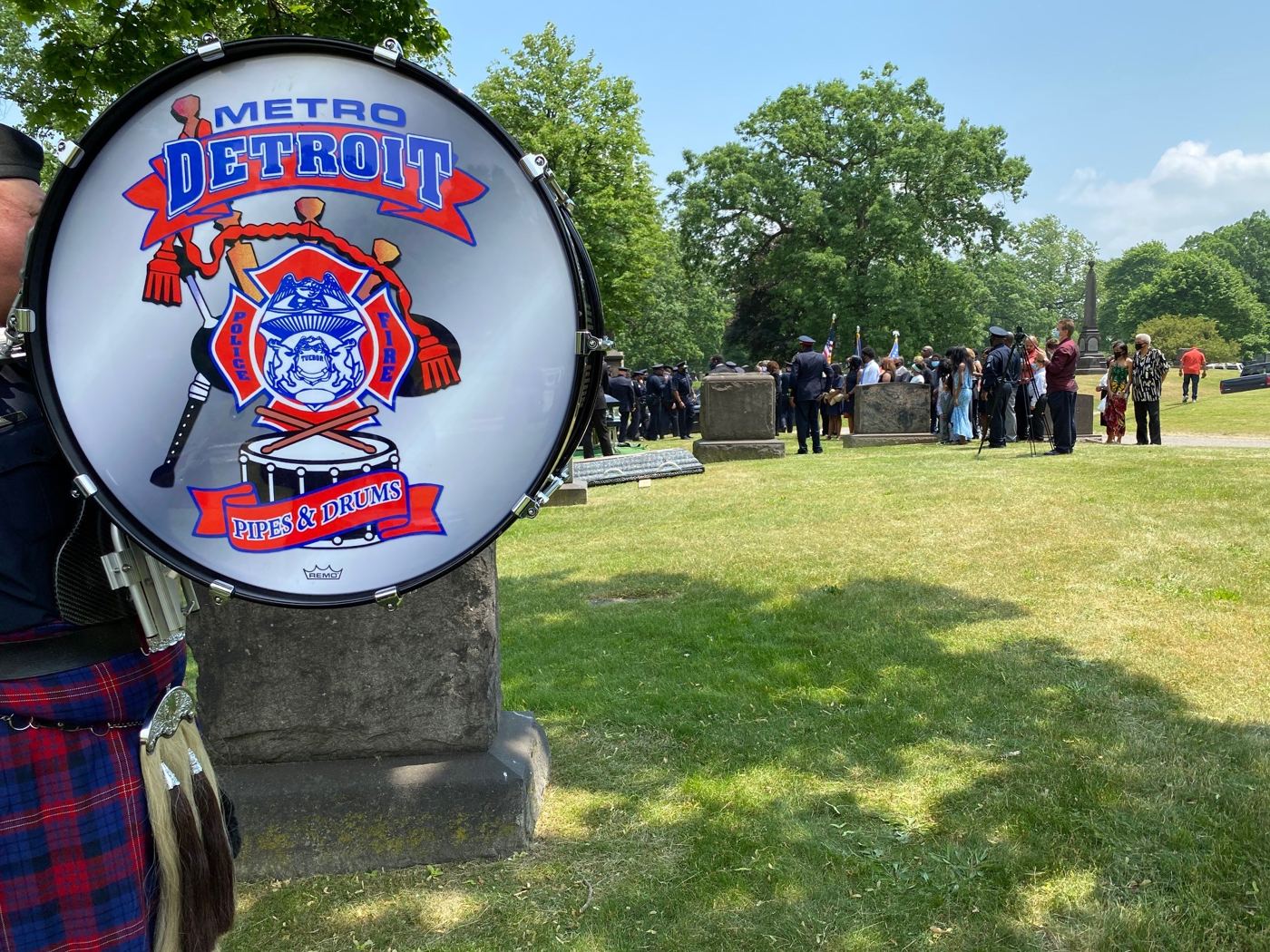 The band's bass drum head, featuring the Metro Detroit Pipes and Drums crest